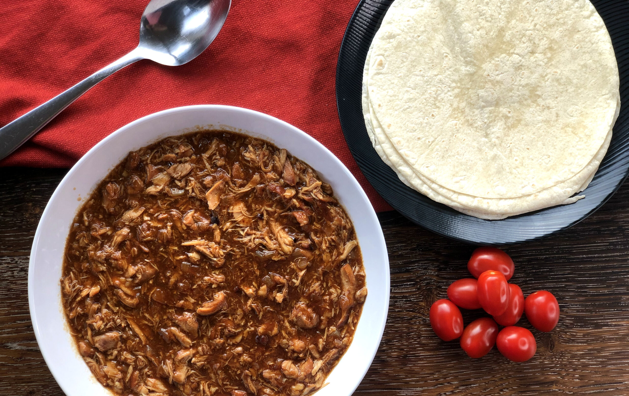 Easy Pulled Chicken slow cooked in BBQ sauce 