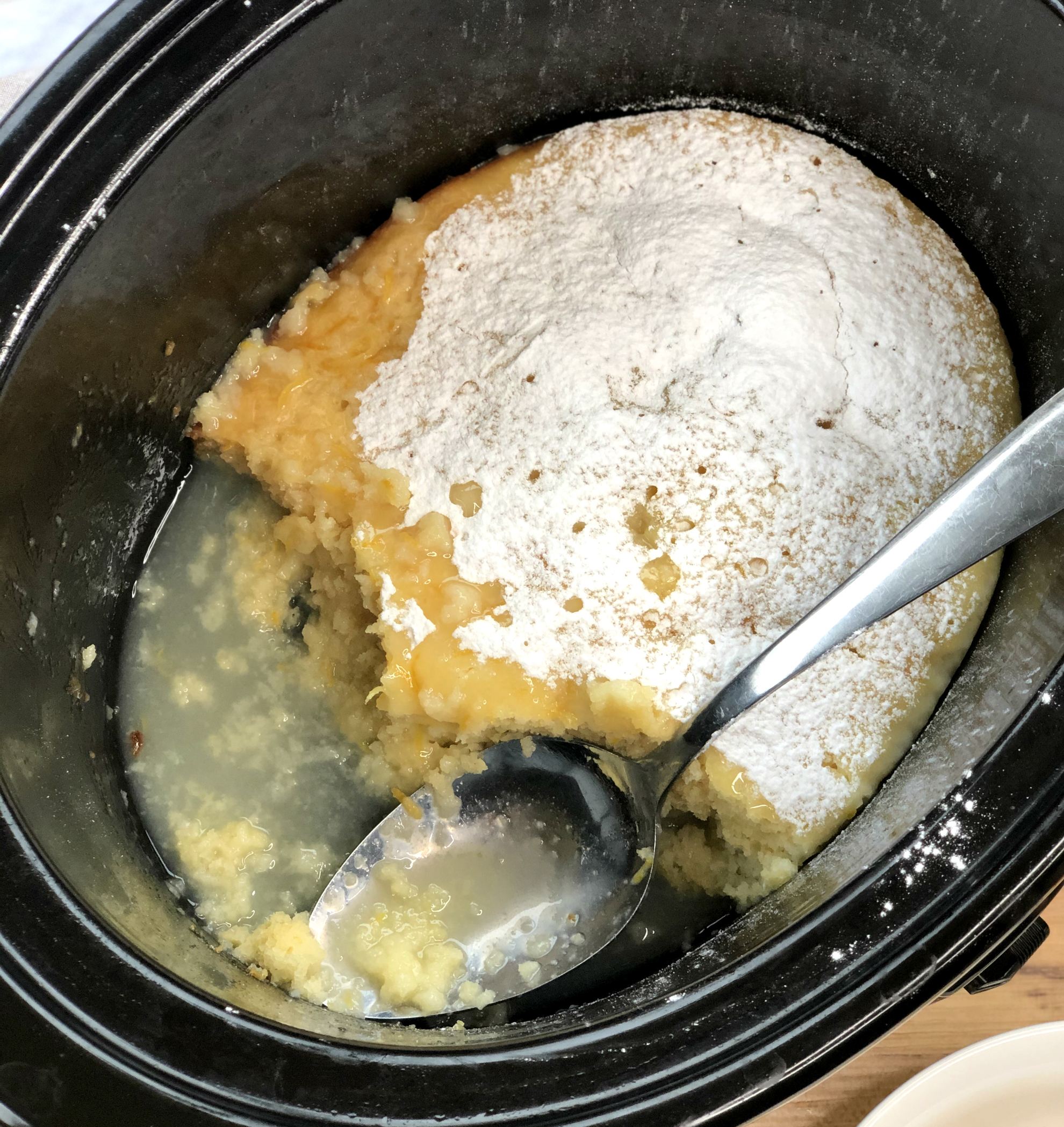 Slow Cooker Dessert with a big scoop taken out