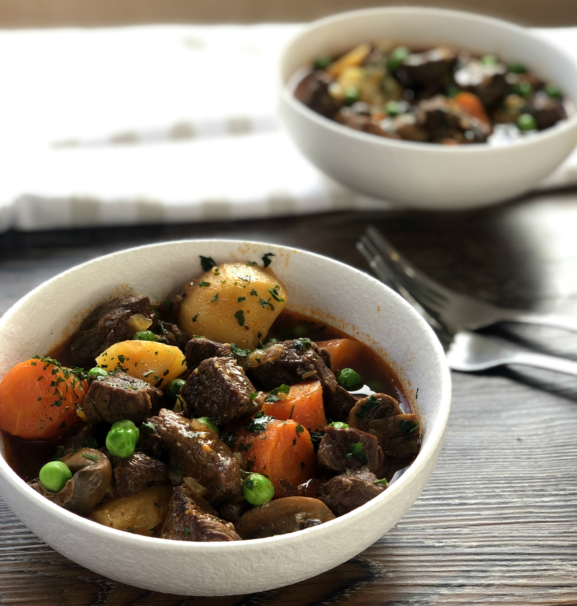 Bowls of Slow Cooker Beef Stew with veges