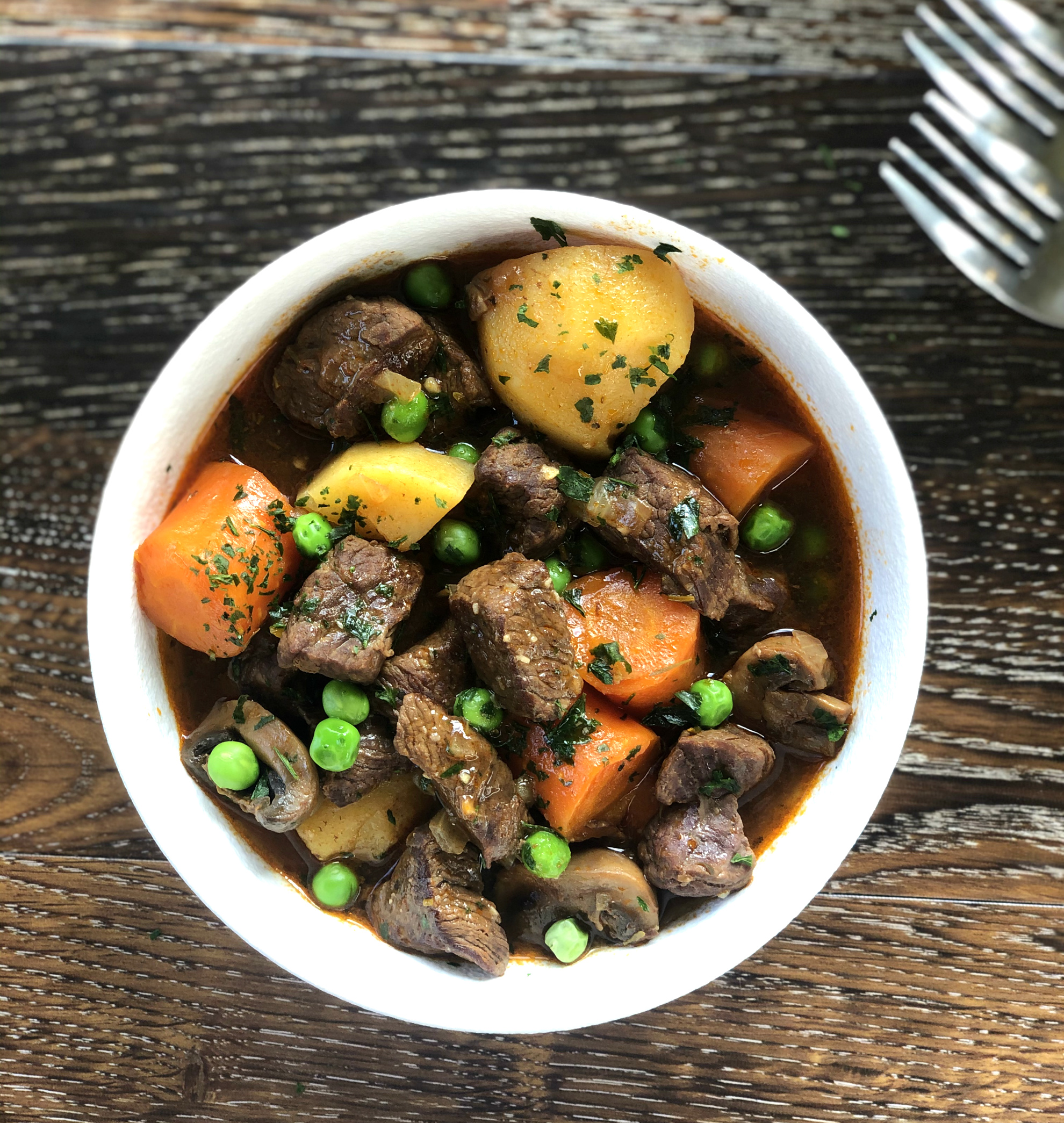 Bowl of one pot beef stew with vegetables