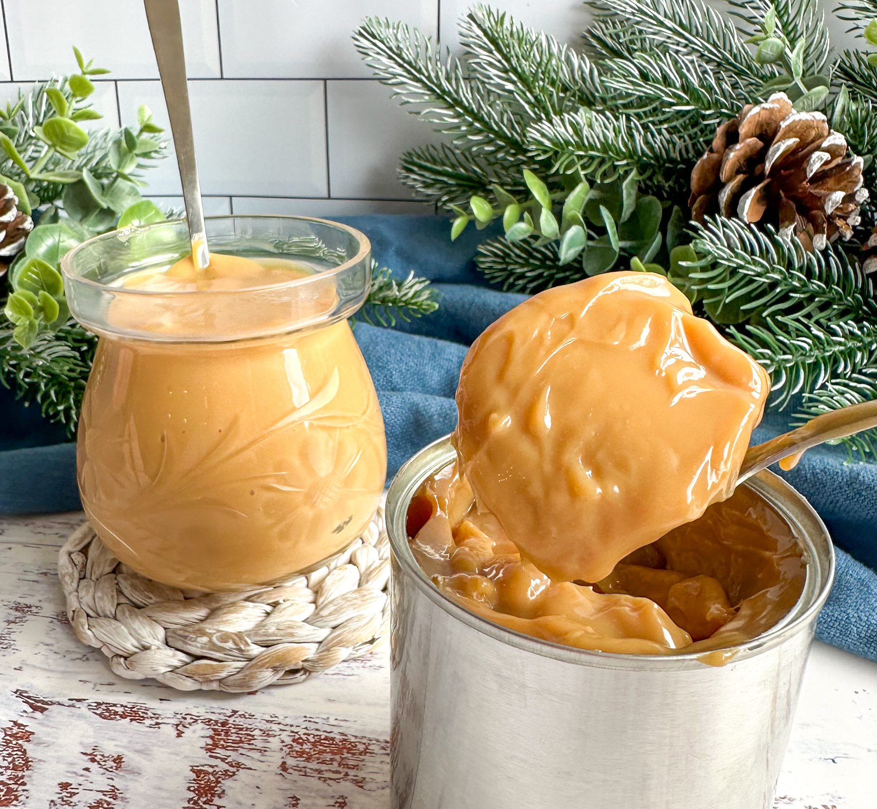 A can of dulce le leche and some in a glass jar