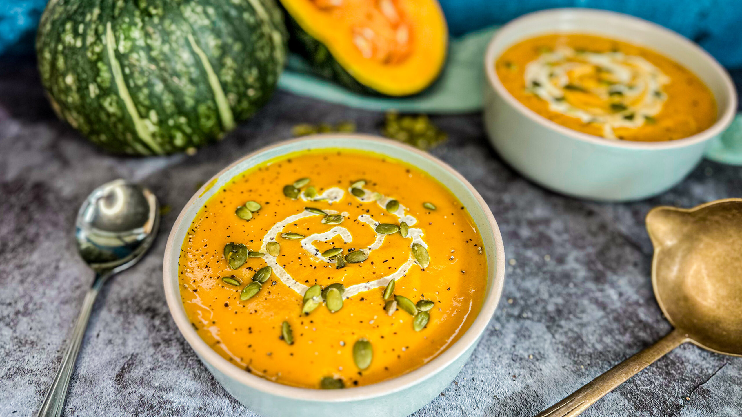 Two bowls of slow cooker pumpkin soup make with fresh butternut squash