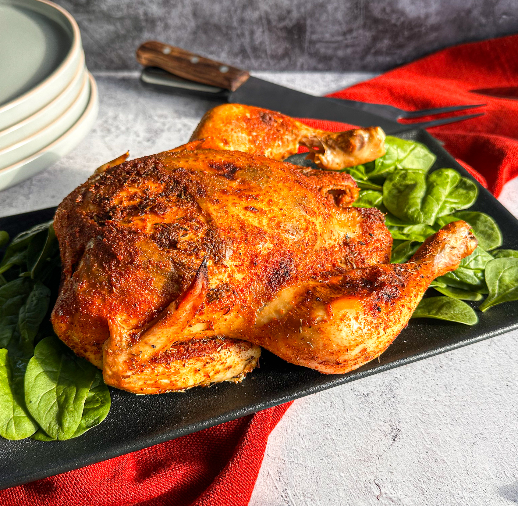 Whole golden brown chicken with methods on how to cook a chicken in a slow cooker