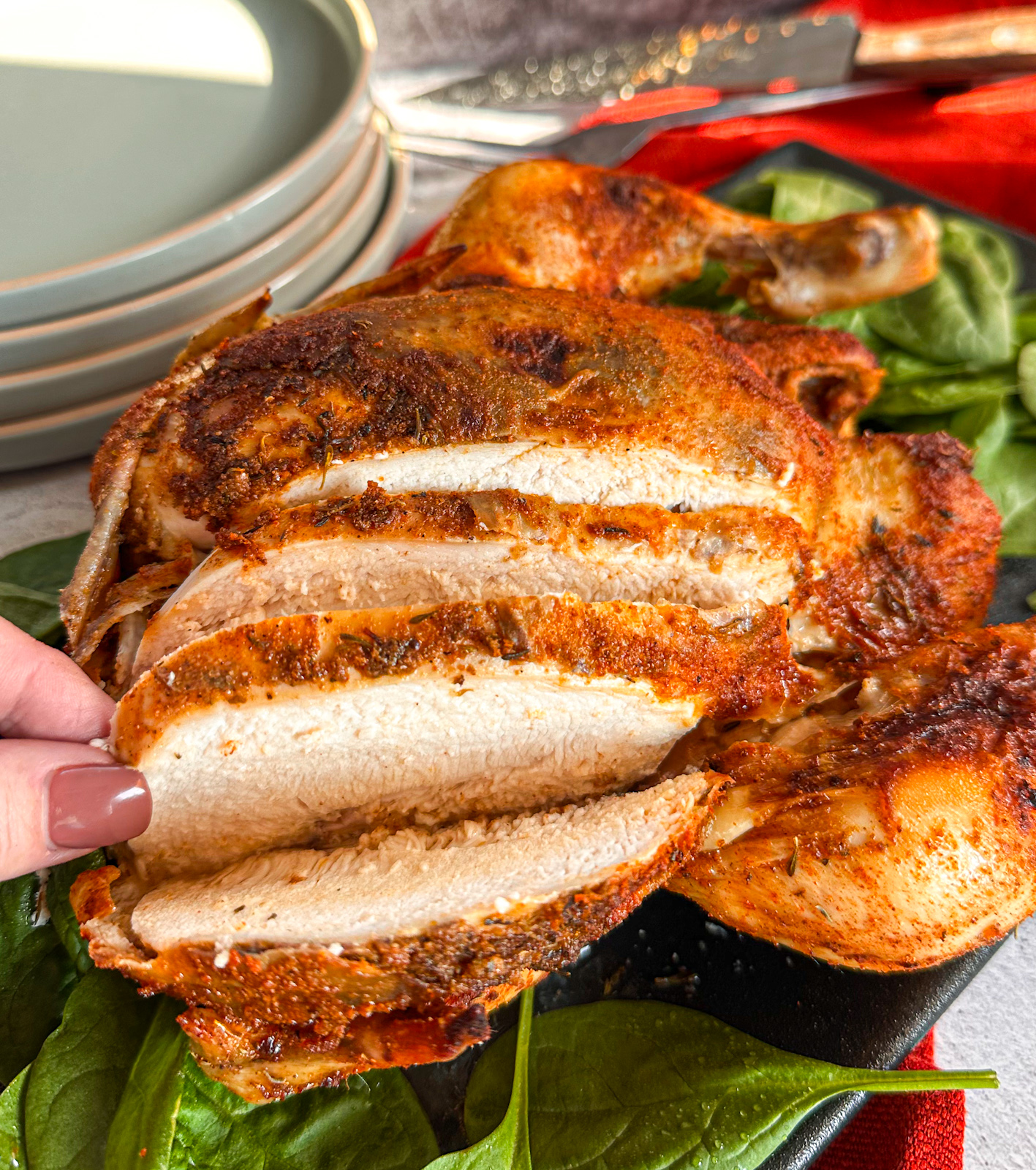 Golden brown slow cooker chicken sliced into tender pieces