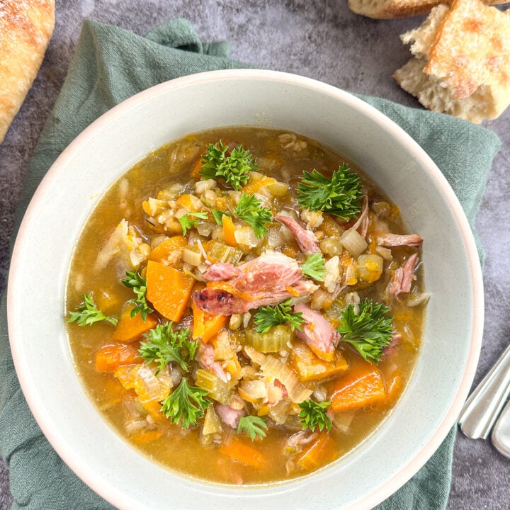 bowl of ham hock and vegetable slow cooker soup