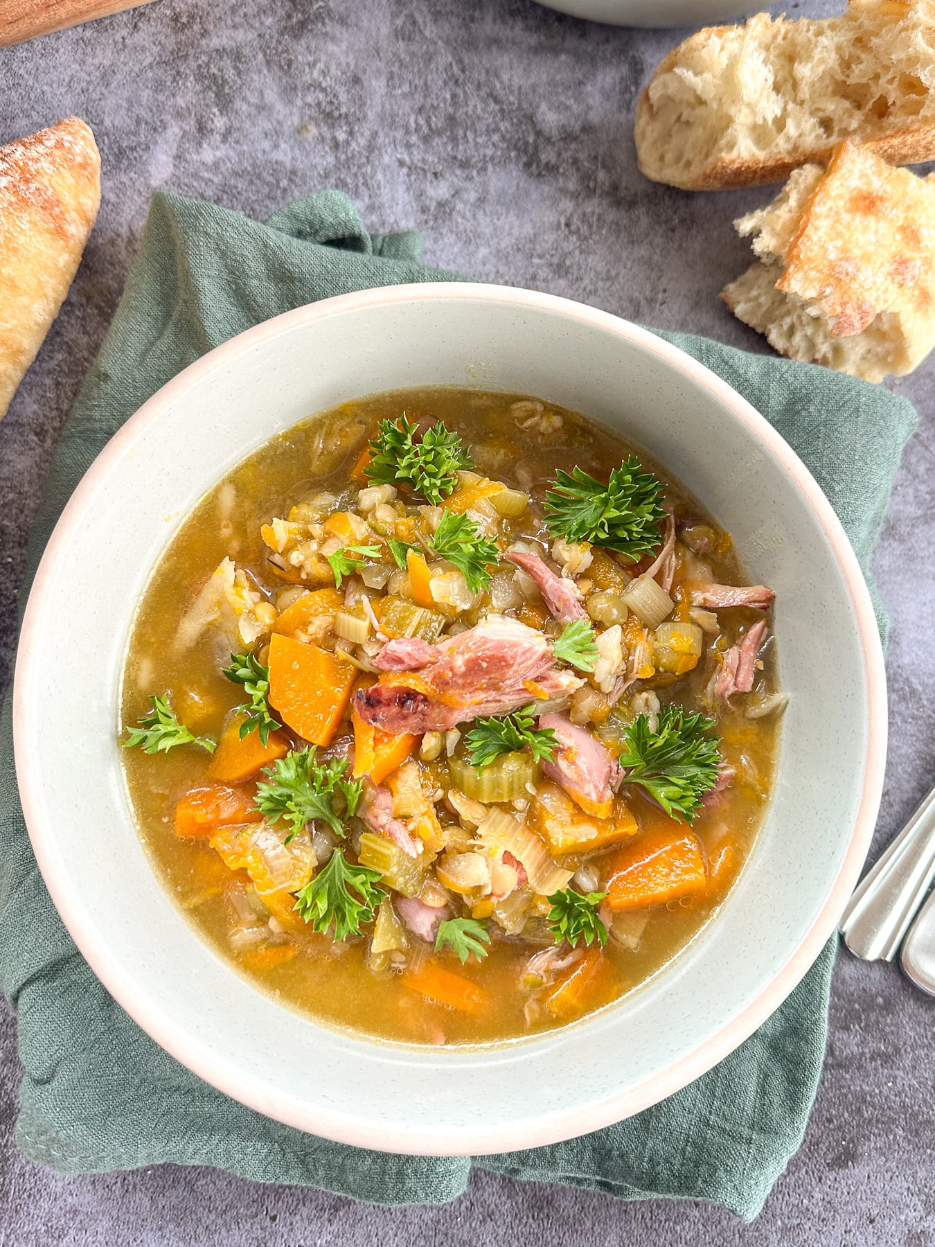 bowl of ham hock and vegetable slow cooker soup
