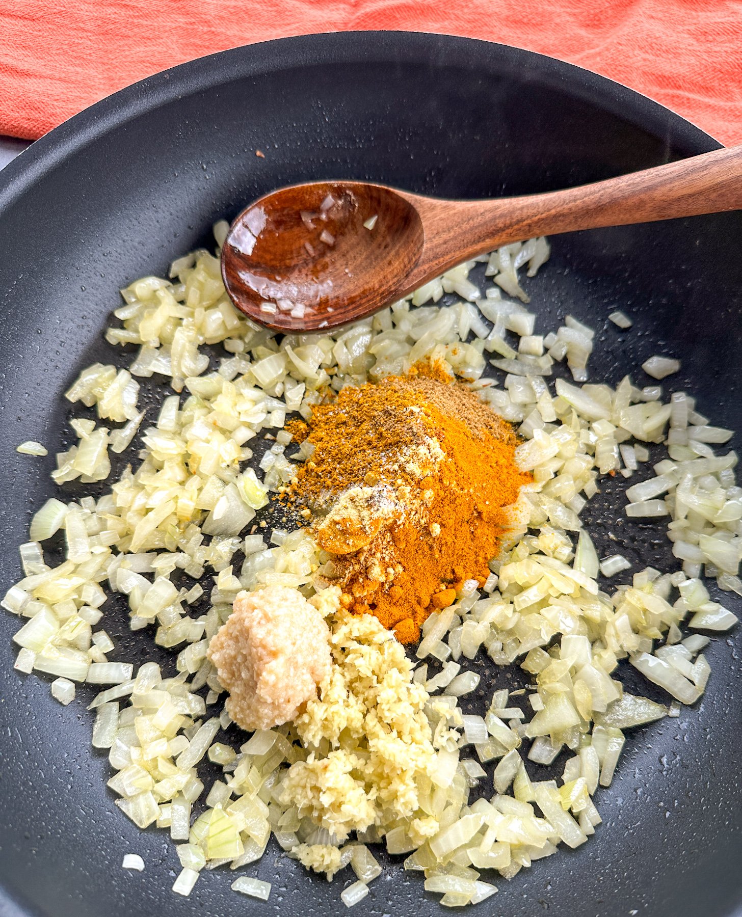 sautéed onions with spices and garlic for red lentil curry