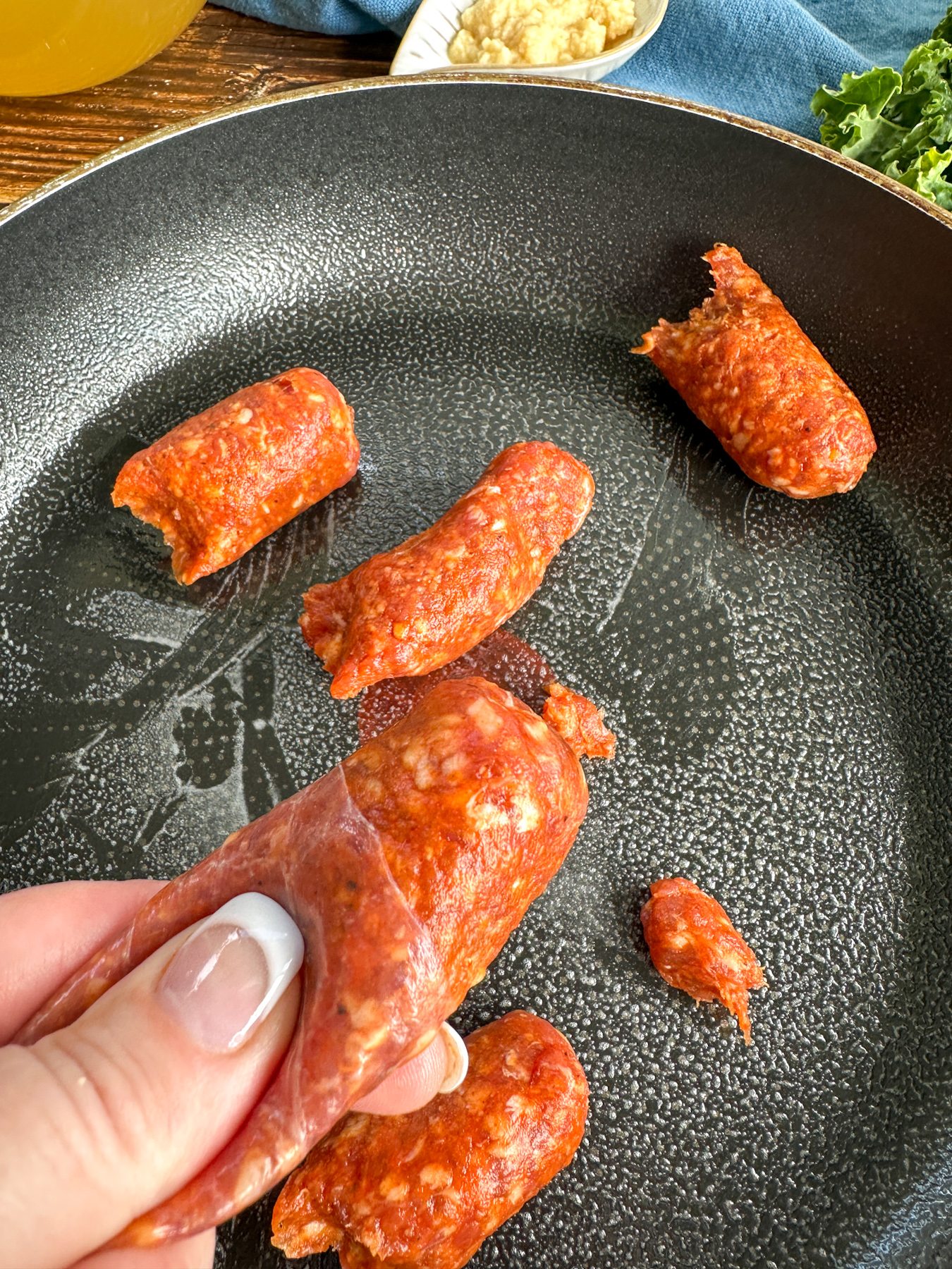 squeeze the sausage from the casing before browning