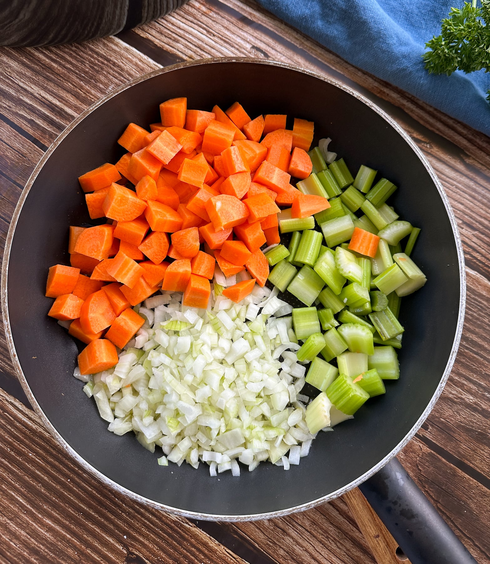 skillet with diced carrots, celery and onion to begin the Soffritto
