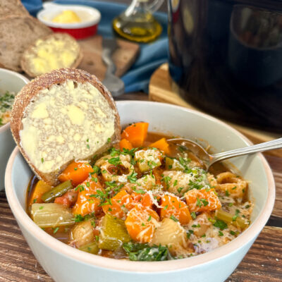 bowl of minestrone vegetable soup made in the crockpot