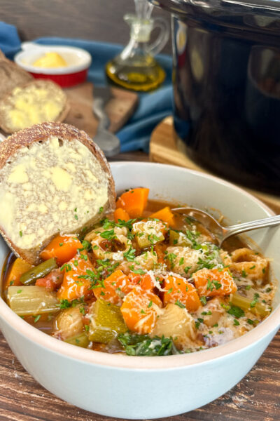 bowl of minestrone vegetable soup made in the crockpot