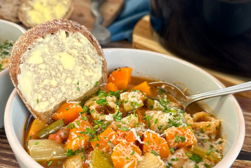 bowl of minestrone vegetable soup made in the crockpot
