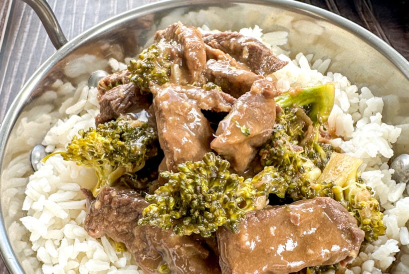 bowl of beef and broccoli with sauce