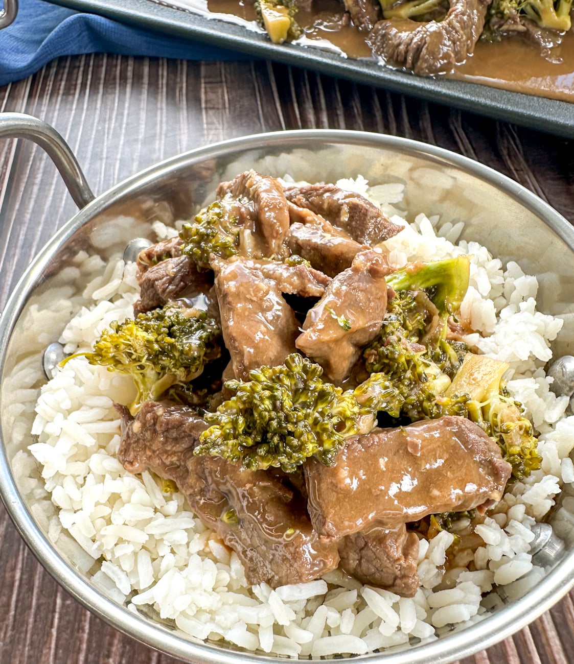 bowl of beef and broccoli with sauce