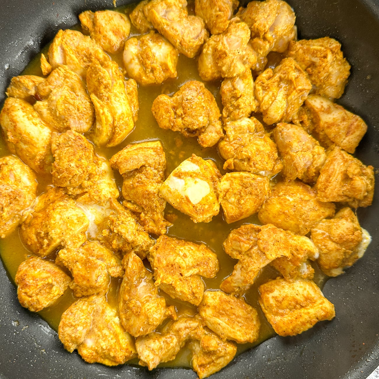 grilling or frying the chicken for colour