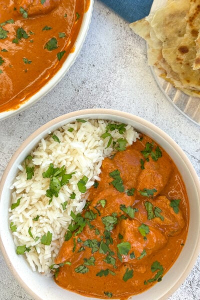 bowl of butter chicken with rice