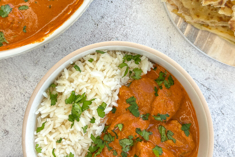 bowl of butter chicken with rice