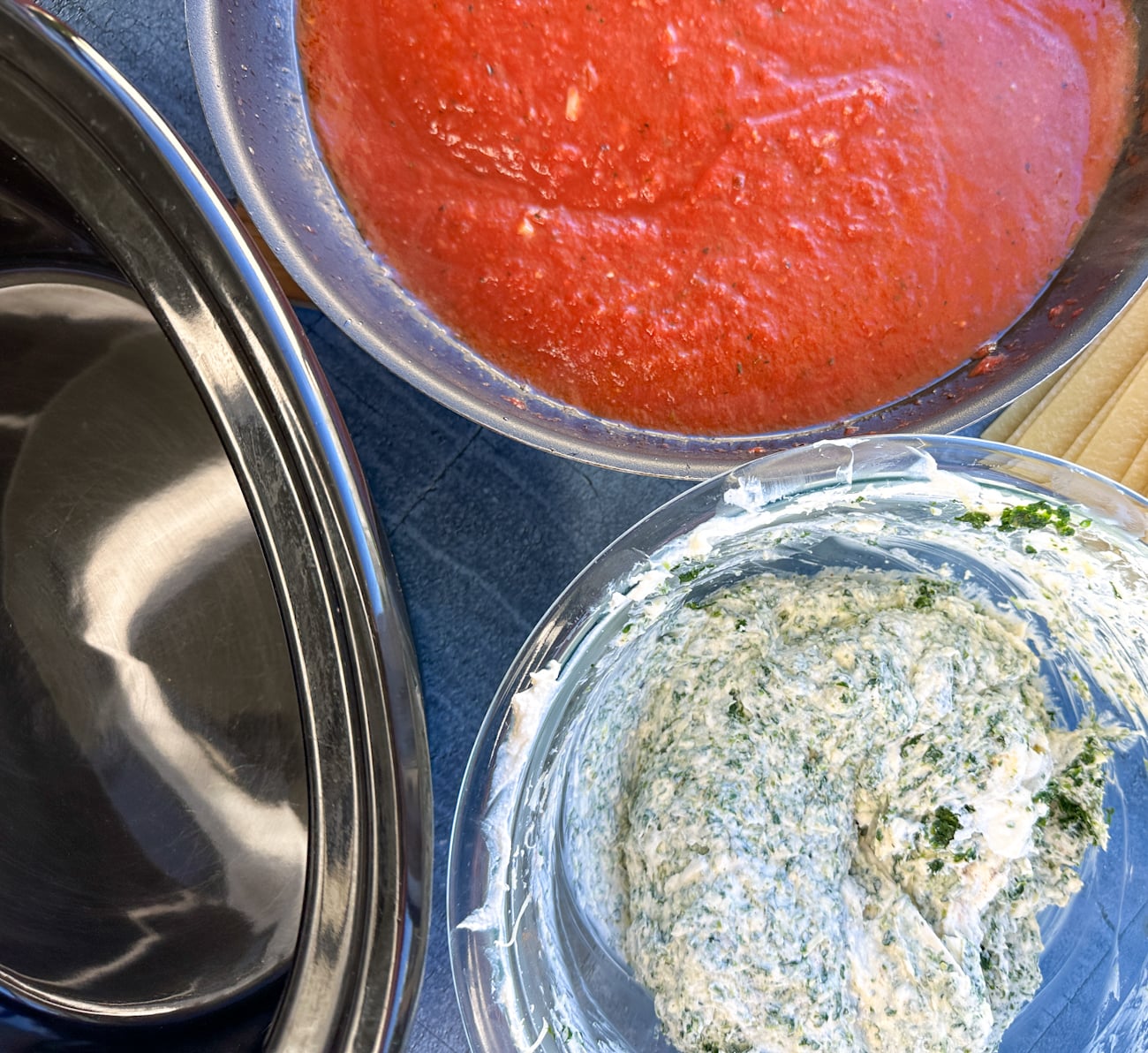 sauce and spinach ricotta mix ready for the slow cooker