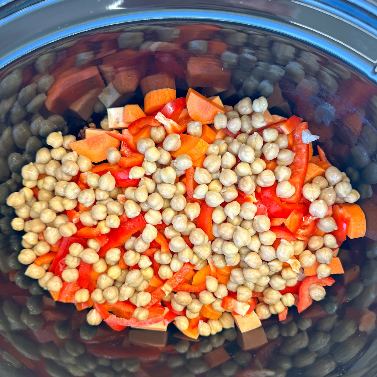 add the peppers and chick peas to the slow cooker