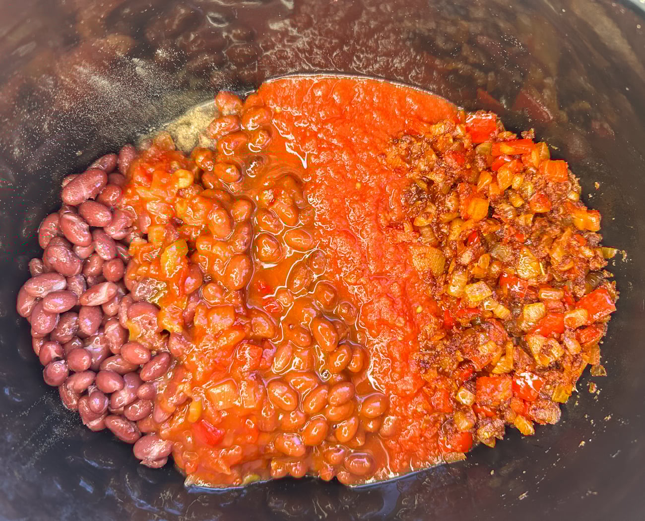 vegetarian chili ingredients in a large slow cooker