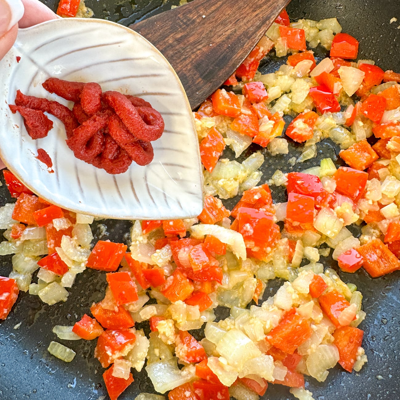 saute the vegetables with tomato paste step
