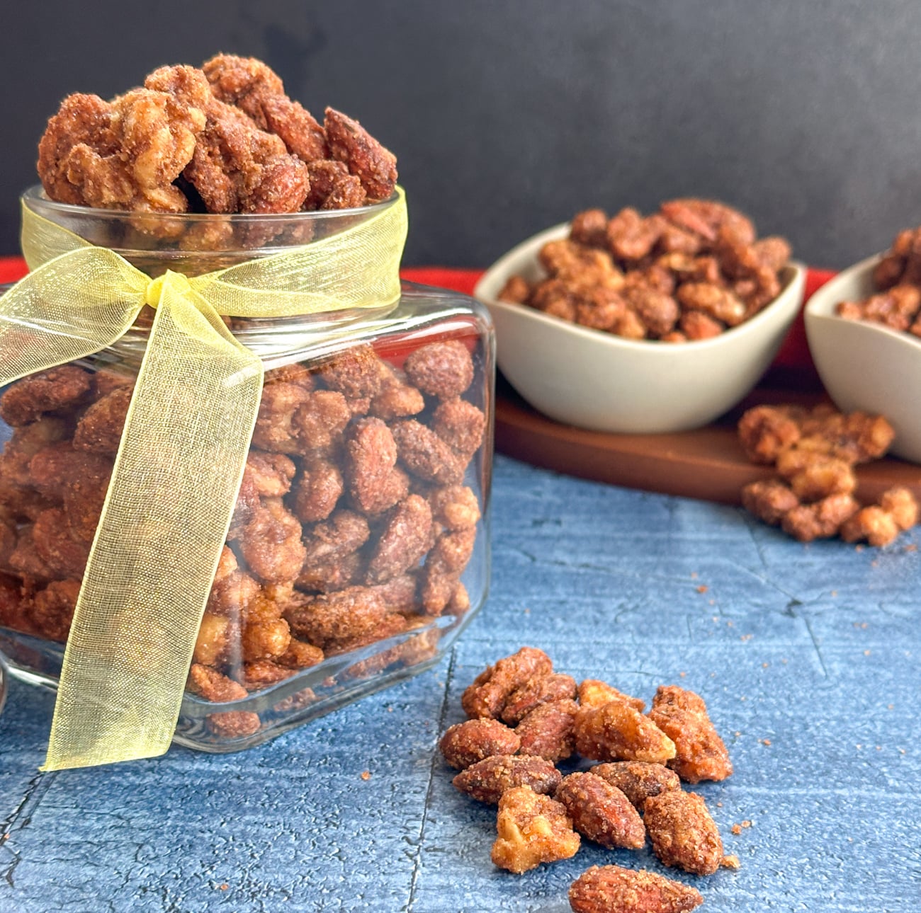 gift jar of candied spiced nuts and two small serving bowls