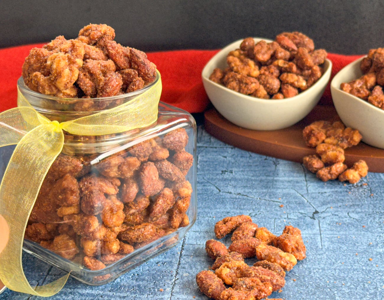 Jar of candied nuts with a ribbon