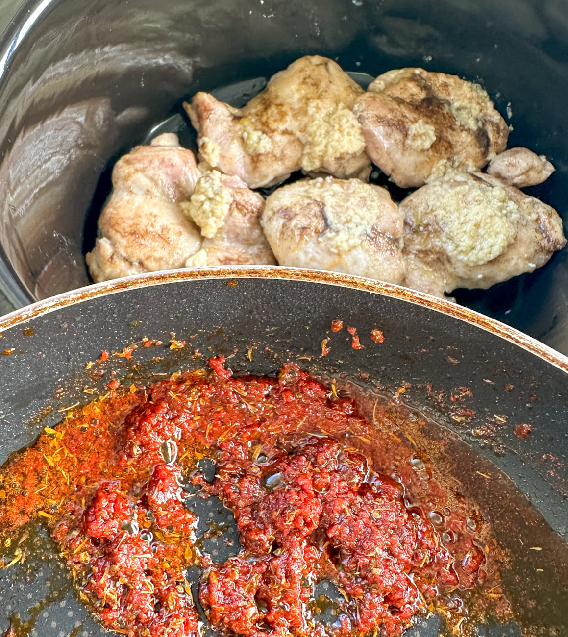 tomato paste and garlic with pan brownings to create flavour