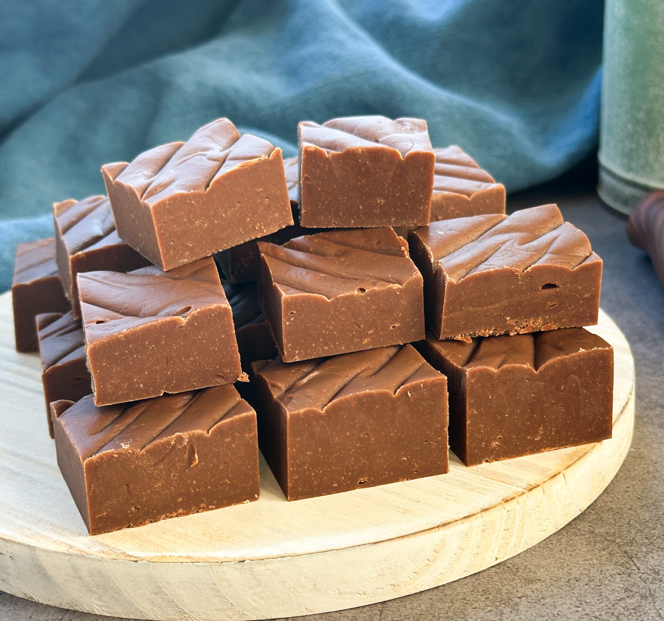 plate of pieces of milk chocolate fudge cut into small squares