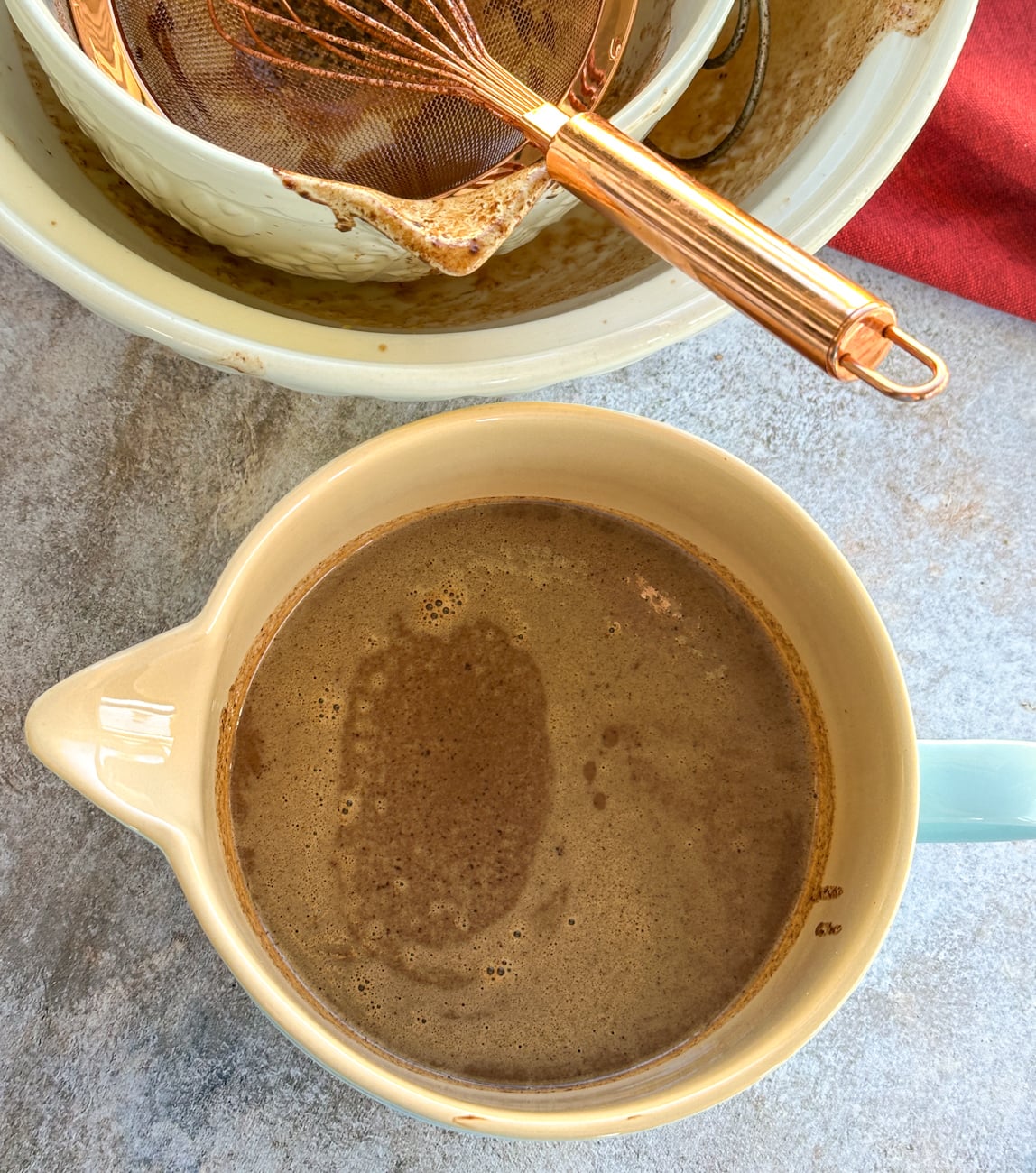 resting the chocolate custard to cool slightly