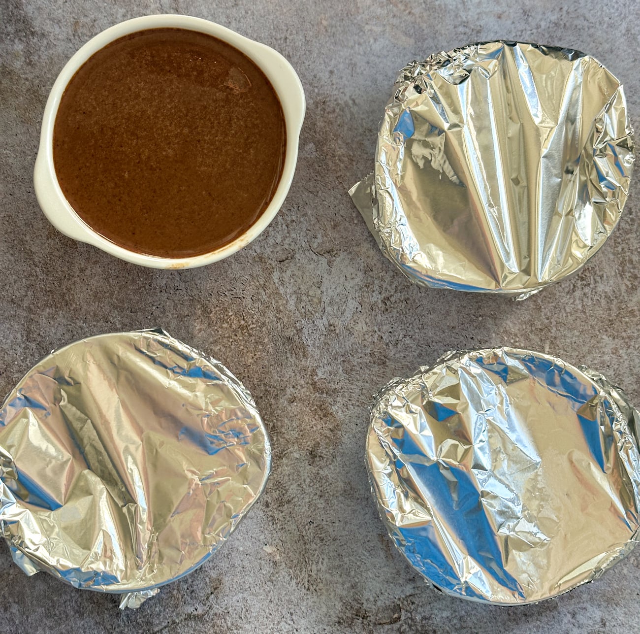 cover the ramekins with foil before slow cooking