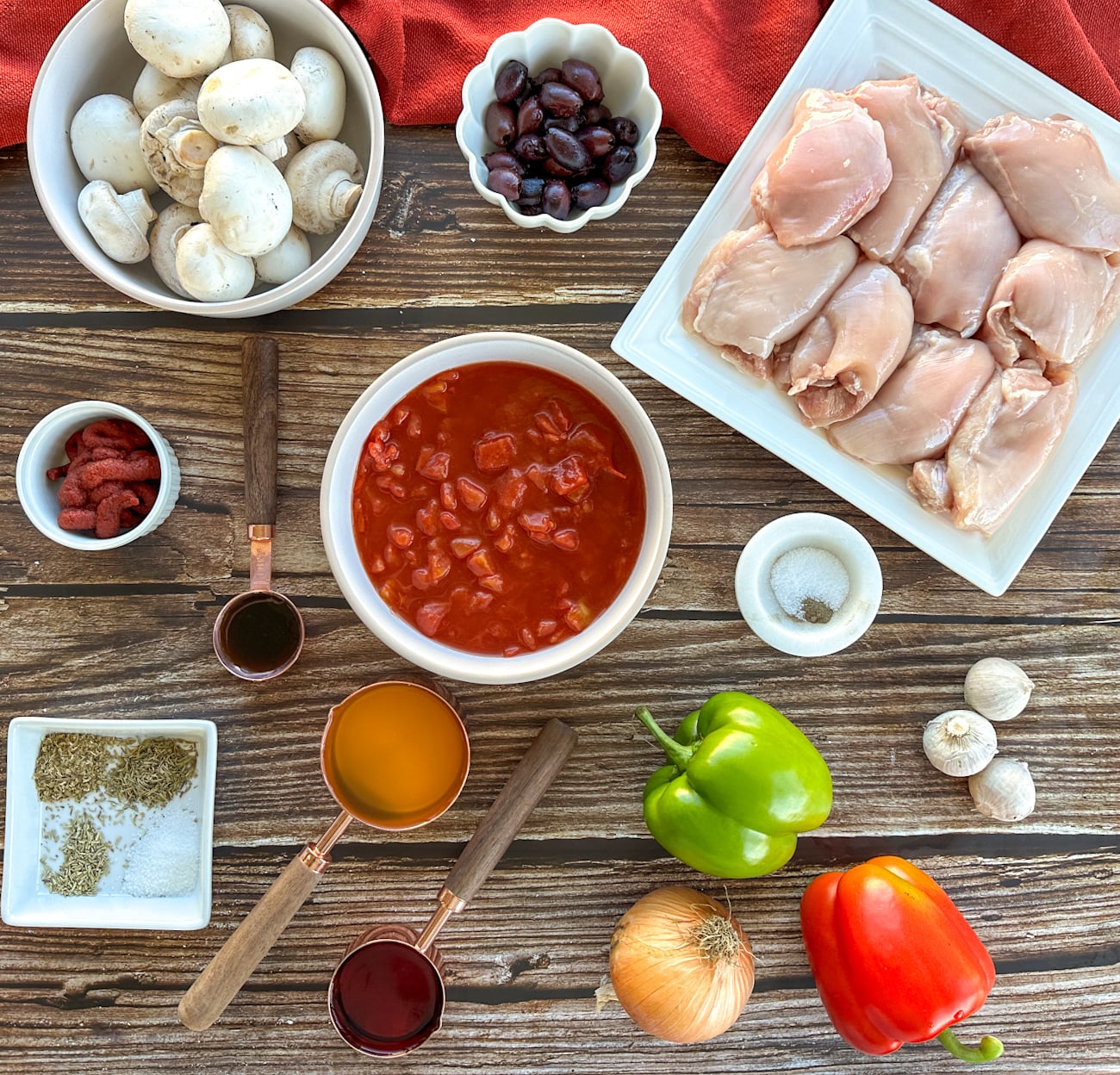 Fresh ingredients required to make chicken cacciatore as listed in recipe card
