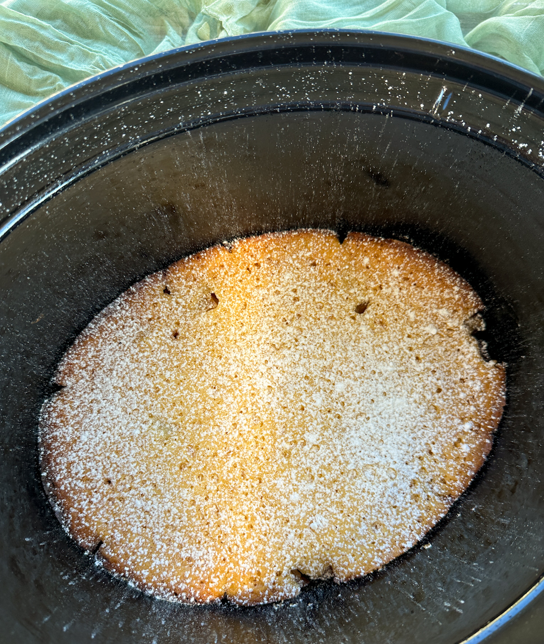 dusted apple sponge pudding in a slow cooker