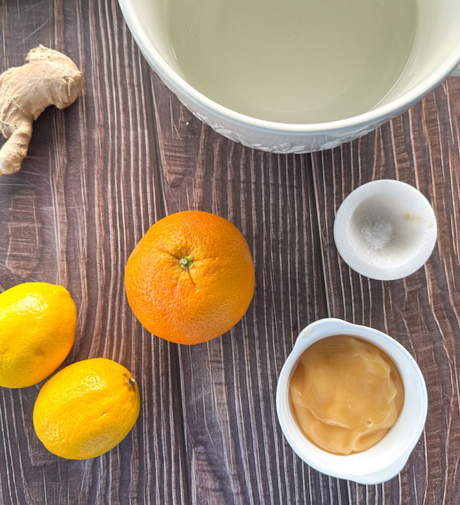 ingredients for making lemon honey ginger drink.