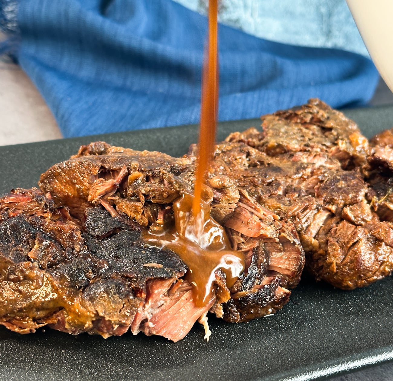 pour the gravy over the tender beef cheeks to serve