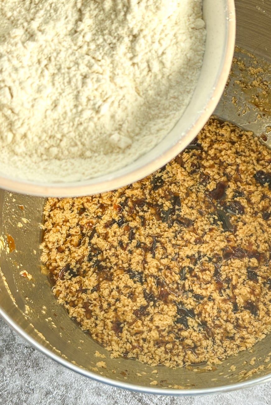 adding the flour to the batter