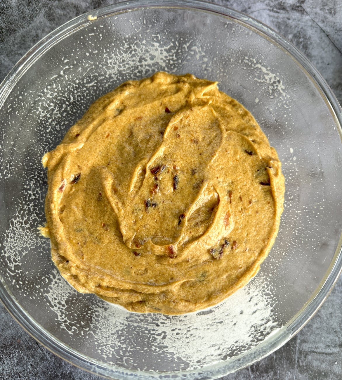 sticky date pudding batter in a glass bowl